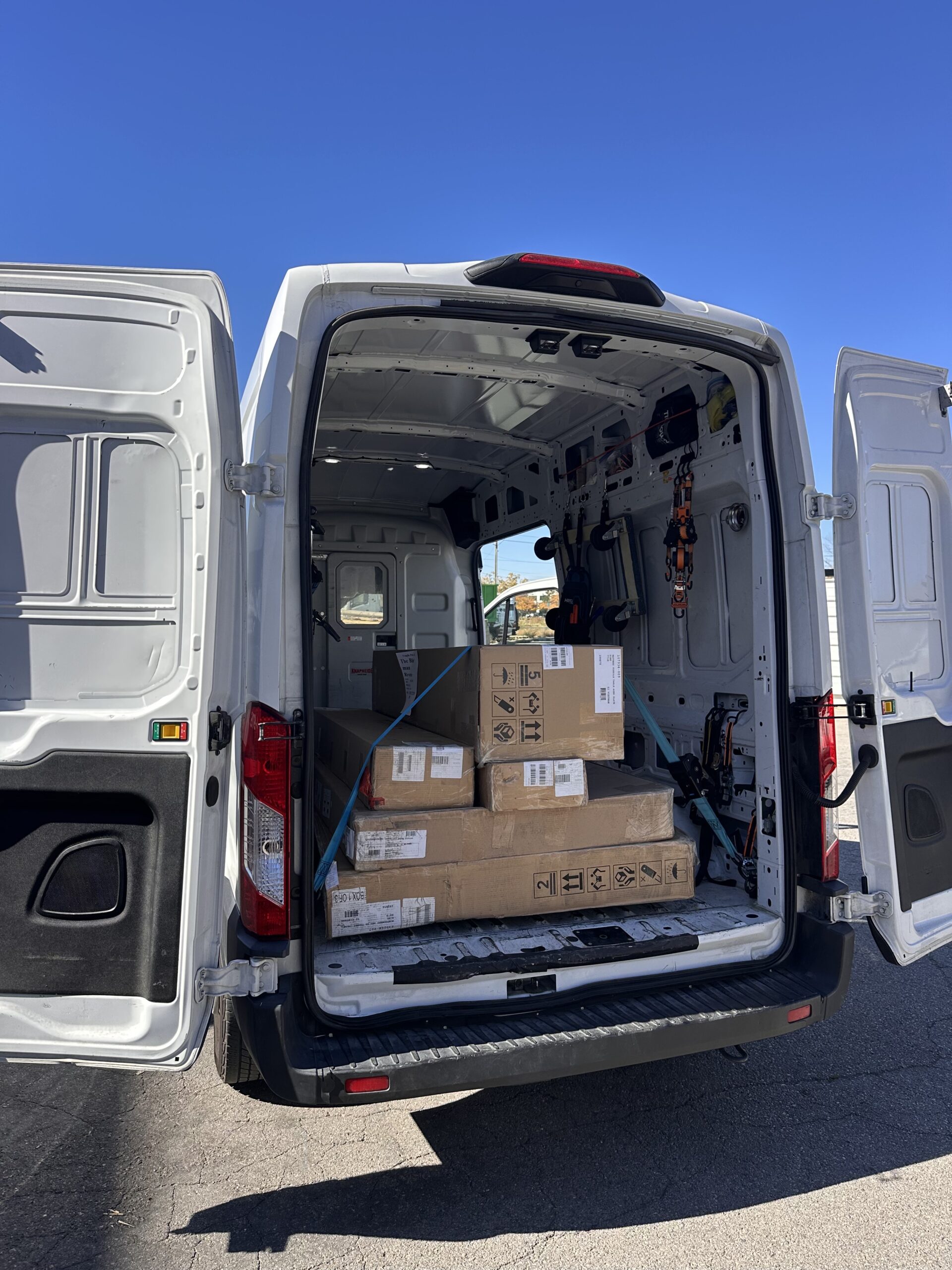 Furniture In boxes preassembly waiting for Rush Home Delivery pickup at vendor warehouse.